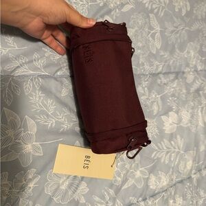 Beis expandable crossbody charm in burgundy